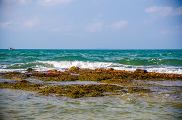 Ocean waves breaking on the rocks on the shore. - 391543038