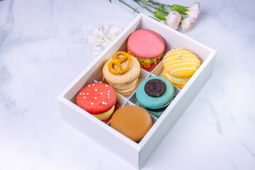macaroons,macaroons in paper box on white background ,white marble texture background