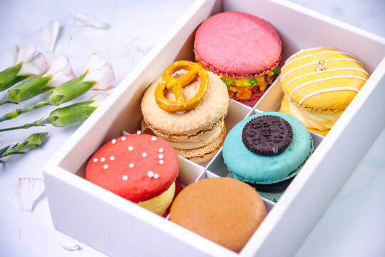 macaroons,macaroons in paper box on white background ,white marble texture background