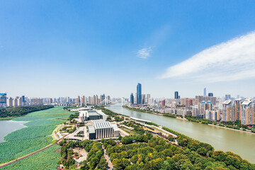 Qintai Grand Theater in Wuhan, Hubei, China and sunny scenery of Hanjiang City © Govan