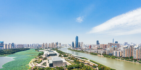 Qintai Grand Theater in Wuhan, Hubei, China and sunny scenery of Hanjiang City © Govan