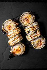 Vertical frame, set of 8 hot rolls on black stone board