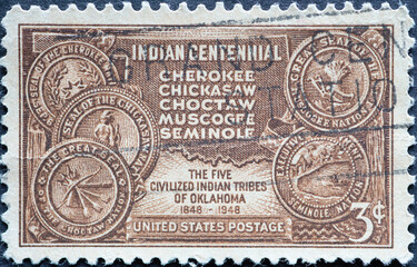 USA - Circa 1948 : a postage stamp printed in the US showing the Five Civilized Tribes in Oklahoma....