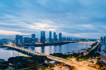 Early morning scenery of CBD cities along Min River in Fuzhou, Fujian, China