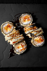 Vertical frame, set of 8 hot rolls on black stone board