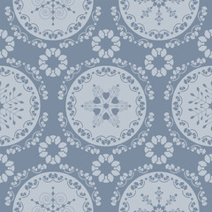 Seamless pattern christmas theme. Pretty mandalas and Frieze around with angels. Snowflakes, hearts and spirals. Color pastel blue.