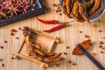 Braised duck feet, a traditional Wuhan snack on a bamboo mat