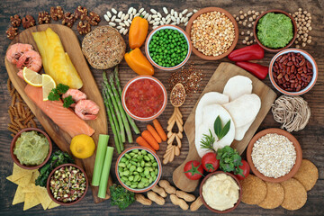 Low glycemic health food for diabetics with all foods below 55 on the GI index. High in antioxidants, vitamins, minerals, protein, fibre, omega 3 & smart carbs. Healthcare concept. On rustic  wood.