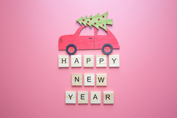 Happy new year text, on pink background