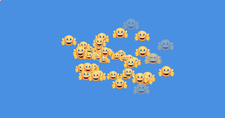 Emoji with fingers up on blue background.