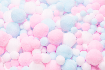 White, pink and blue soft pompons.