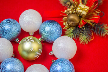 Christmas decorations on a red background. Holiday decorations. Christmas concept. white and blue christmas toys