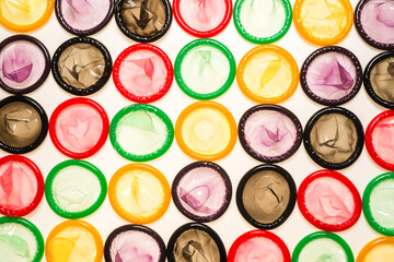 Colorful condoms background.