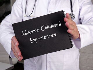 Medical concept about Adverse Childhood Experiences with phrase on the sheet.