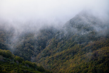 Low clouds cover the peaks of the Sierra de Oribio