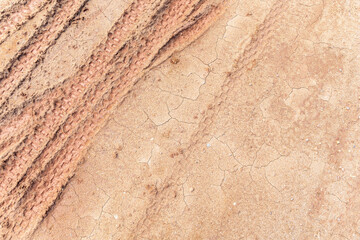 closeup tire tracks marks of motorcross on the soil. top view. flat lay