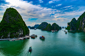 Fototapeta na wymiar Hilltop view of Ha Long Bay and ocean in Vietnam during the summertime.
