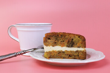 Close up Carrot Cake with Hot Latte , Pink Background