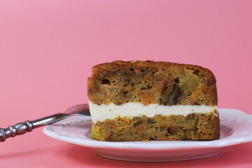 Close up Carrot Cake with Hot Latte , Pink Background
