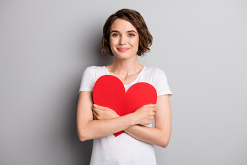 Photo of young attractive girl happy positive smile hug embrace big paper card present gift...