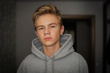 Head shot of healthy teenage boy, Portrait happy boy looking at camera with smiling face, boy relaxing stay at home during covid lock down.Positive children concept,Social distancing