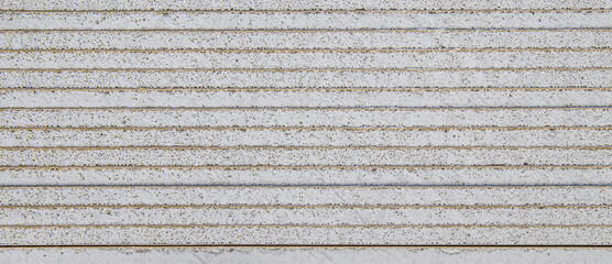 Texture background. A stack of moisture-resistant drywall sheets at a hardware store. Concept repair of an apartment or house