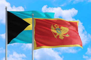 Montenegro and Bahamas national flag waving in the windy deep blue sky. Diplomacy and international relations concept.