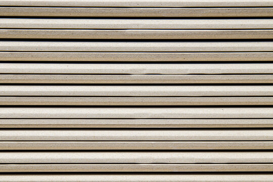 Texture background. A stack of moisture-resistant drywall sheets at a hardware store. Concept repair of an apartment or house