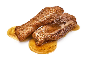 Stuffed ribs with sauce, isolated on white background