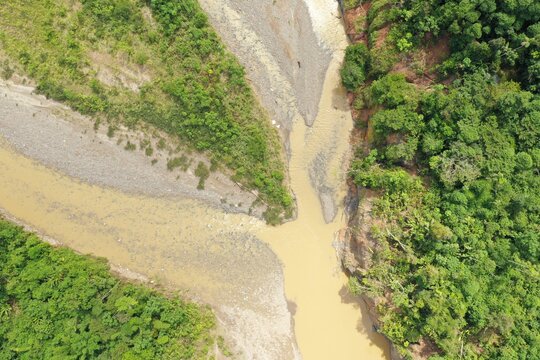 Aerial View Or Top View Of Two Tropical Rivers Merging Together In One Large River