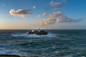 Fototapeta premium Rough seas hitting Godrevy island, Cornwall, in late autumn
