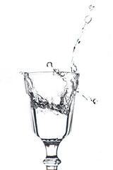 splash of drink in a beautiful crystal glass