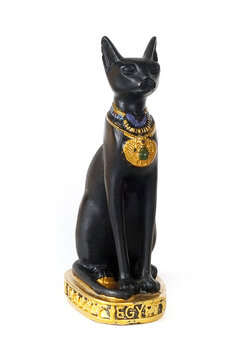 Souvenir from Egypt (goddess Bastet in the form of a black cat) isolated on white background