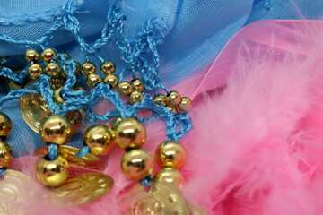 Earrings made by knitting with colored threads