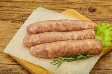 Raw pork meat sausages for grill