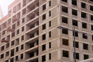 Image of an unfinished high-rise building