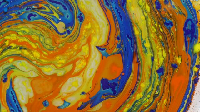 beautiful colored abstract background of moving and mixing liquid paints on water surfacered, painted texture. Juicy candy colors, lollipop