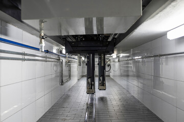 Service maintenance of trucks and cars. Cars in the garage for diagnostics, jack, lift, inspection...