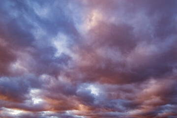 Naklejka na ściany i meble Cloudy skies after rain at sunset time.