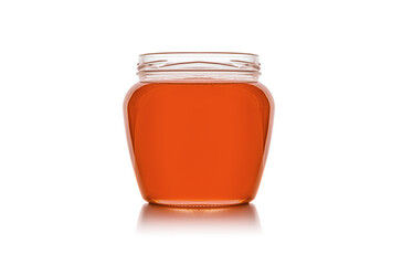 Jar with honey isolated on white background.