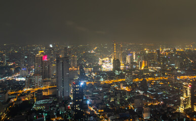 Bangkok, thailand - Nov 07, 2020 : Bangkok downtown cityscape with skyscrapers at night give the city a modern style. No focus, specifically.
