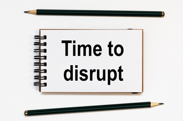 WHITE SPIRAL NOTEBOOK, TWO PENCILS WITH TEXT TIME TO DISRUPT