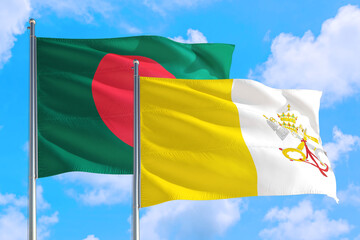 Vatican City and Bangladesh national flag waving in the windy deep blue sky. Diplomacy and international relations concept.