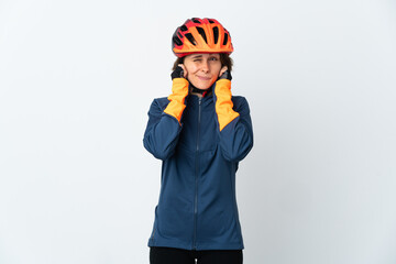 Young English cyclist woman isolated on white background frustrated and covering ears