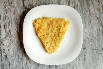 New year's food bull. Flatley salad in the form of a cow first layer. Instructions for the salad. New year 2021, Christmas 2021. Image with selective focus and tinting.