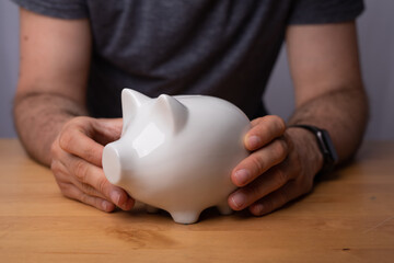 Obraz na płótnie Canvas white piggy bank insurance money