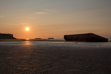 Arromanches ( 'Gold' ) D-Day Beach In Normandy At Sunset