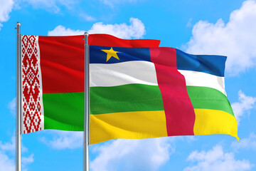 Central African Republic and Belarus national flag waving in the windy deep blue sky. Diplomacy and international relations concept.