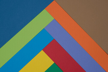 Rainbow color paper palette for background. Shuffled poster board sheets. Overlapping paper