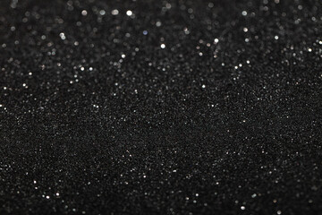 Black glitter textured patterned background